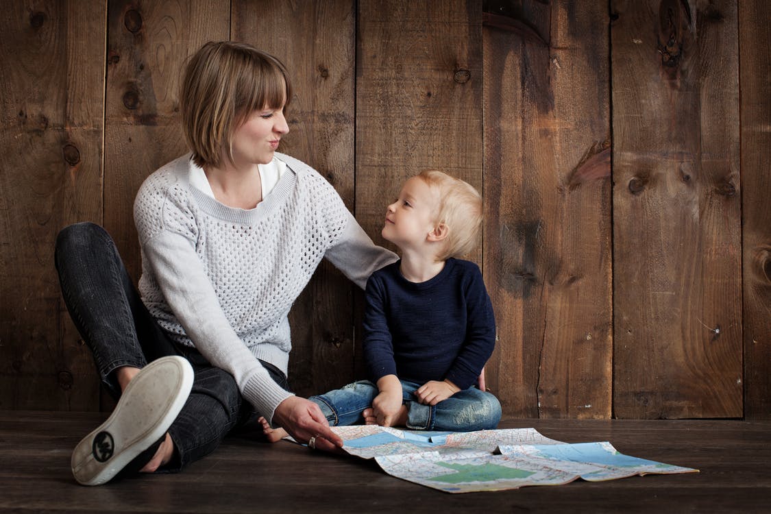 A Montessori educator observing a child at work